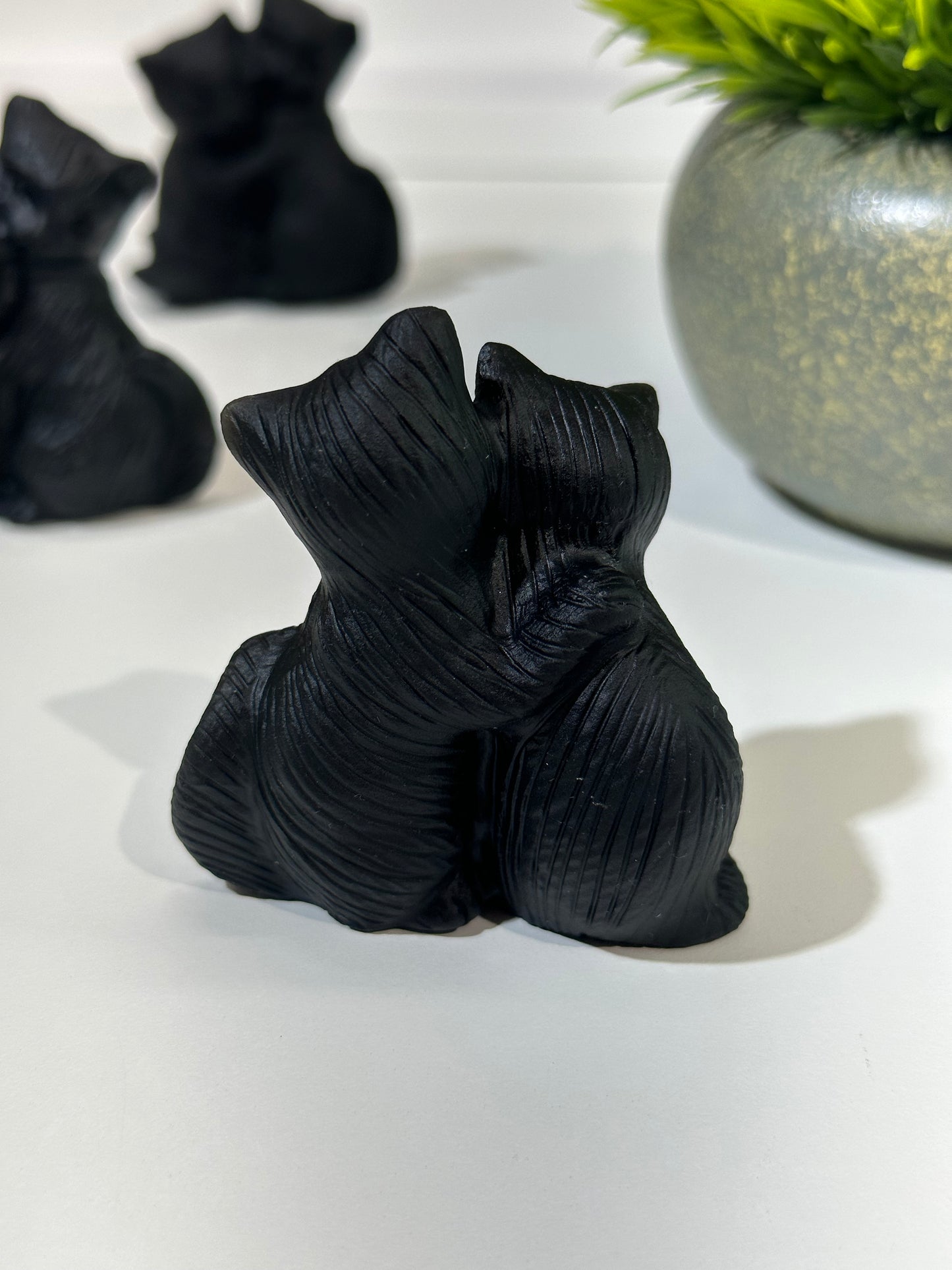 Black Obsidian Hugging Cats Carving